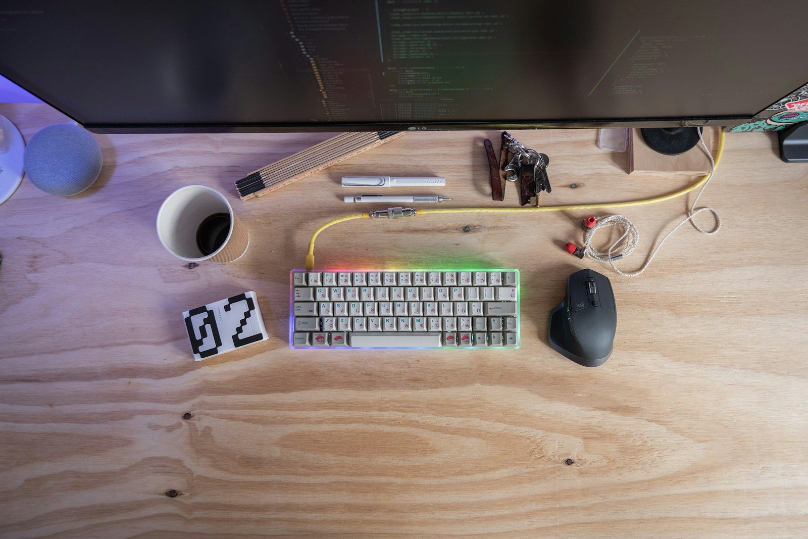 white computer keyboard beside mouse